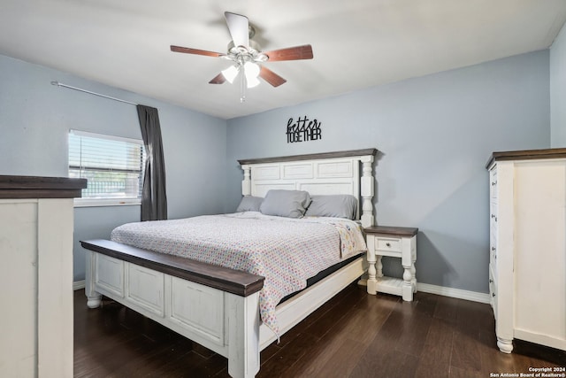 bedroom featuring ceiling fan and dark hardwood / wood-style floors