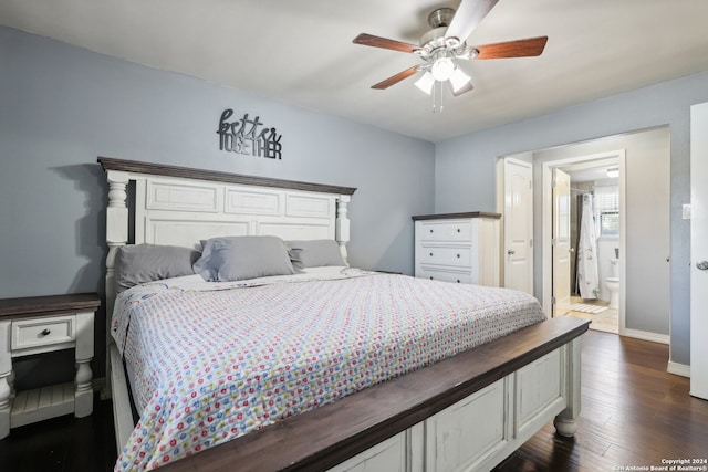 bedroom featuring connected bathroom, ceiling fan, and dark wood-type flooring