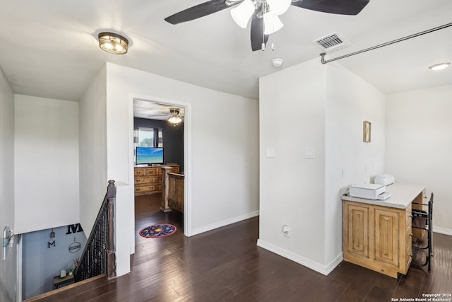 office space with dark wood-type flooring and ceiling fan