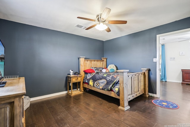 bedroom featuring ceiling fan and dark wood-type flooring