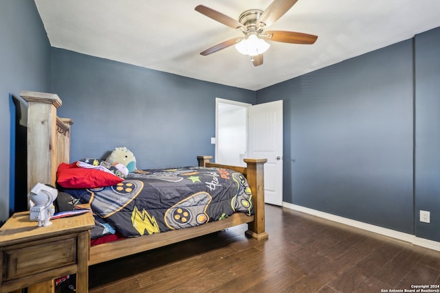 bedroom featuring dark hardwood / wood-style floors and ceiling fan