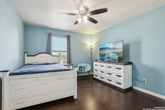 bedroom featuring ceiling fan and dark wood-type flooring