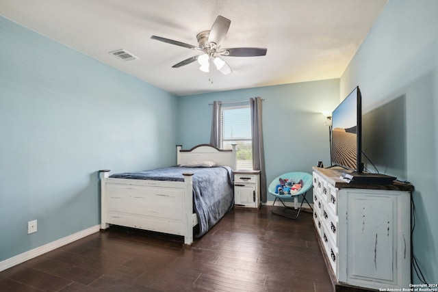 bedroom featuring ceiling fan and dark hardwood / wood-style floors