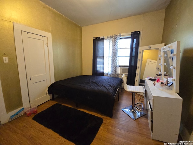 bedroom featuring hardwood / wood-style flooring