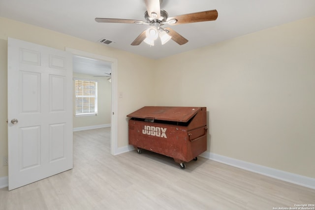 bedroom with light hardwood / wood-style flooring and ceiling fan