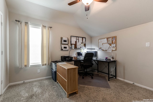 carpeted office space with ceiling fan and vaulted ceiling