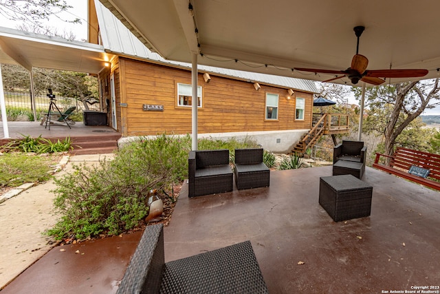 view of patio featuring ceiling fan and outdoor lounge area