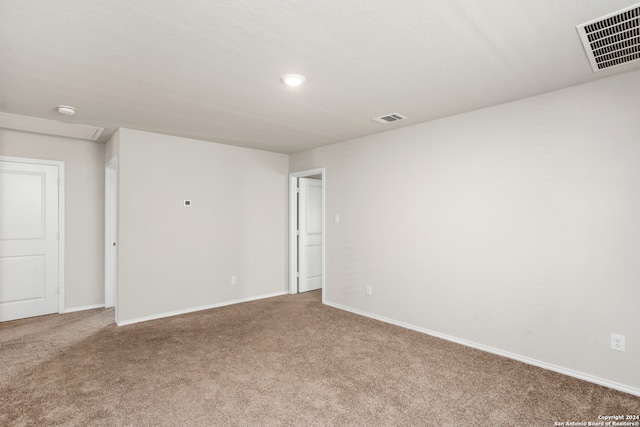 unfurnished room with carpet