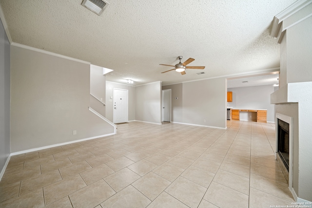 unfurnished living room with a textured ceiling, crown molding, and ceiling fan