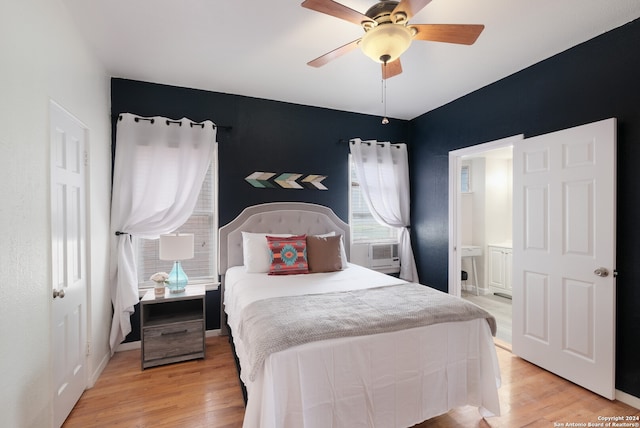 bedroom with light wood-type flooring and ceiling fan