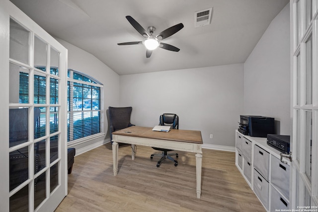 home office with light wood-type flooring, lofted ceiling, and ceiling fan