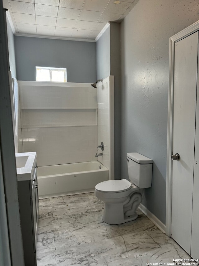 full bathroom featuring ornamental molding, vanity, toilet, and bathtub / shower combination