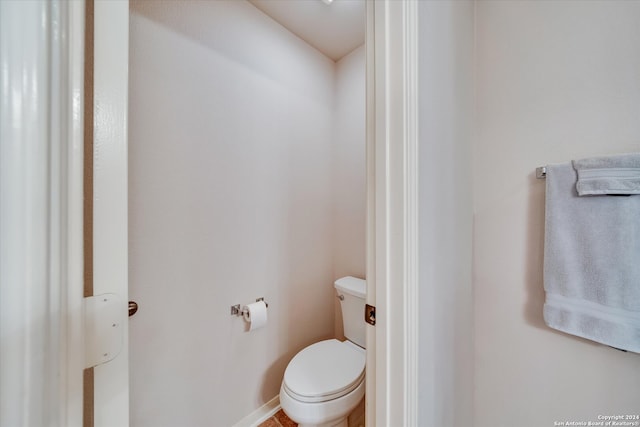 bathroom featuring toilet