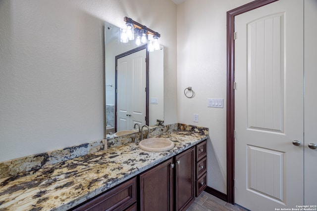 bathroom featuring vanity and hardwood / wood-style floors