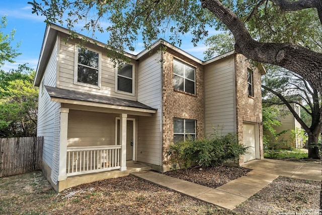 view of front of property featuring a garage