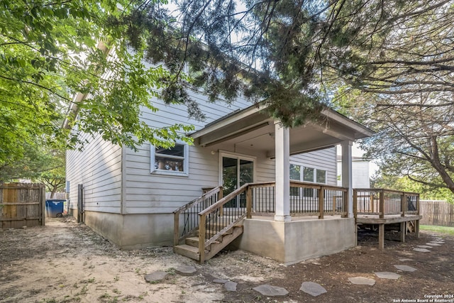 rear view of property with a deck