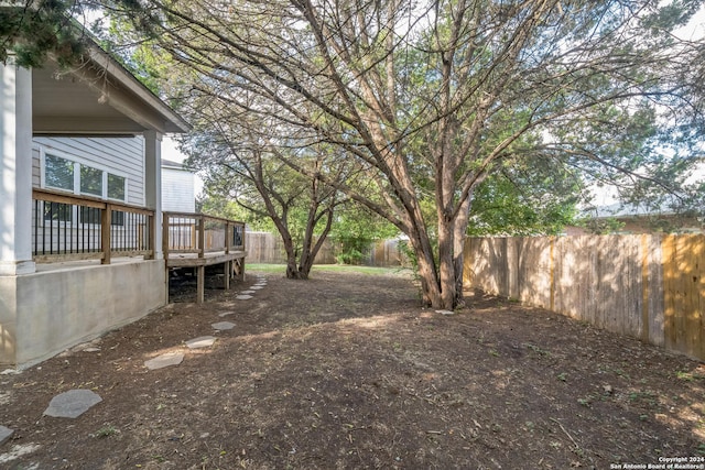 view of yard with a deck