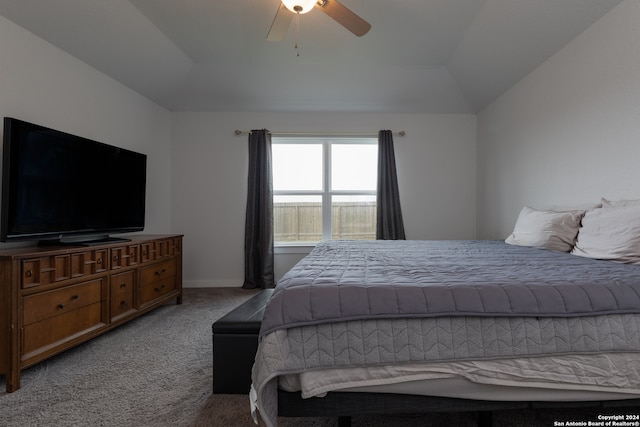 carpeted bedroom featuring vaulted ceiling and ceiling fan