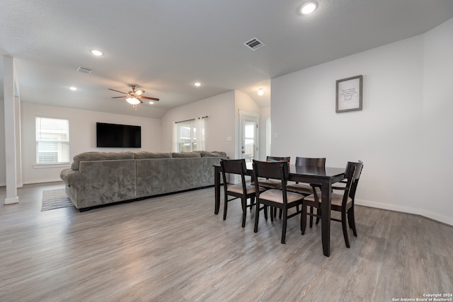 dining room featuring light hardwood / wood-style floors and ceiling fan