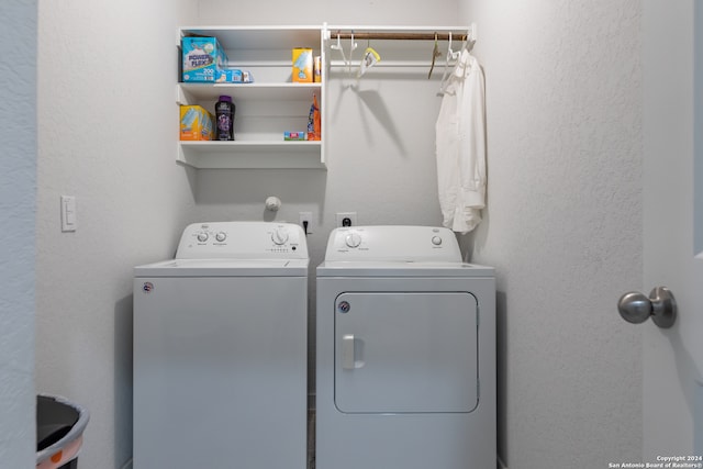 washroom with separate washer and dryer