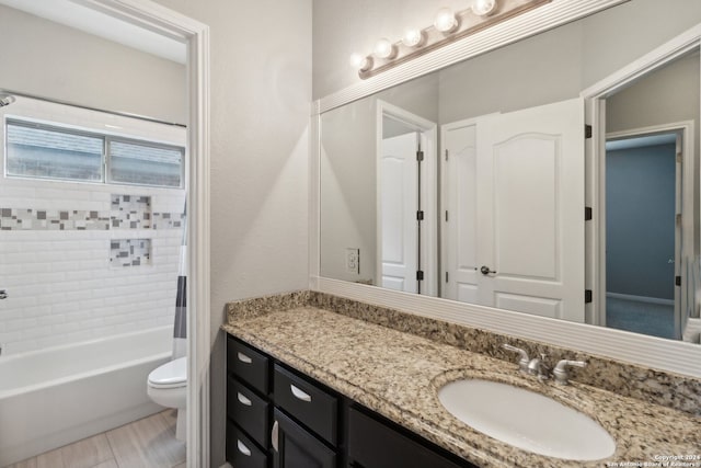 full bathroom with vanity, toilet, and shower / bath combo with shower curtain