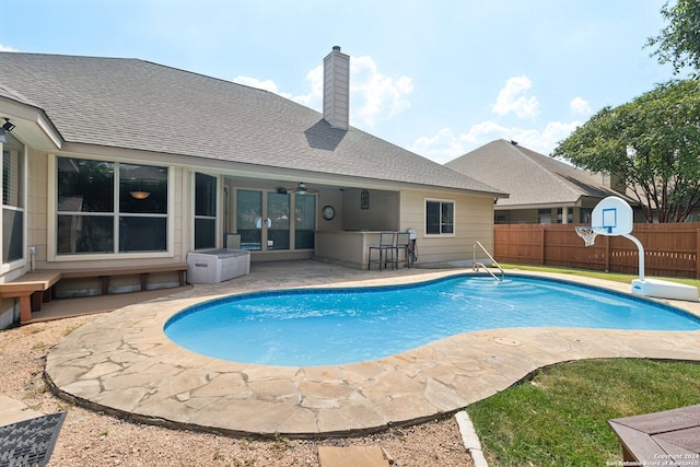 view of swimming pool featuring a patio