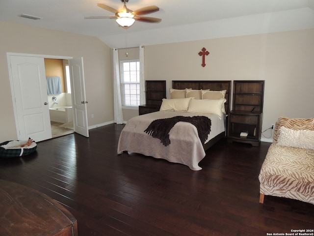 bedroom with ceiling fan, dark wood-type flooring, and ensuite bathroom