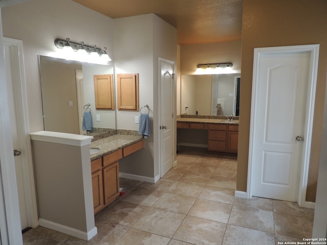 bathroom featuring vanity and tile patterned floors