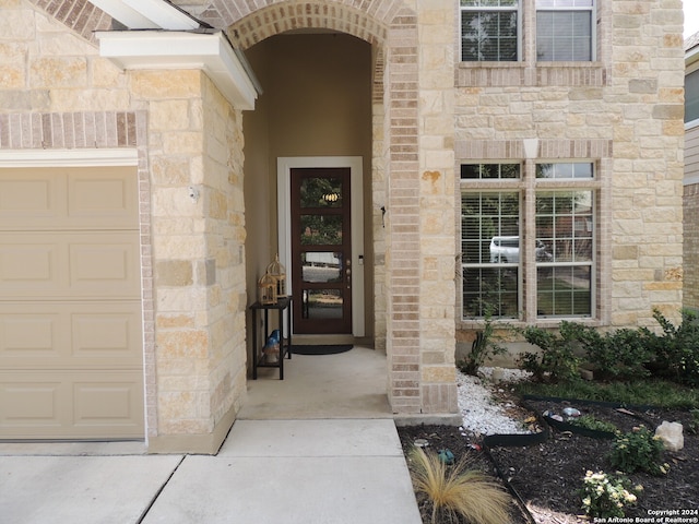 property entrance featuring a garage