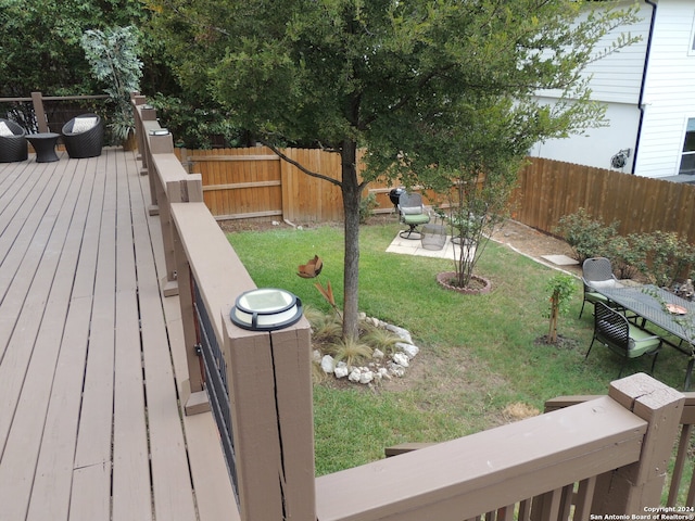 view of yard featuring a wooden deck