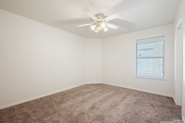 carpeted empty room with ceiling fan