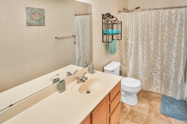 bathroom with walk in shower, vanity, toilet, and tile patterned floors