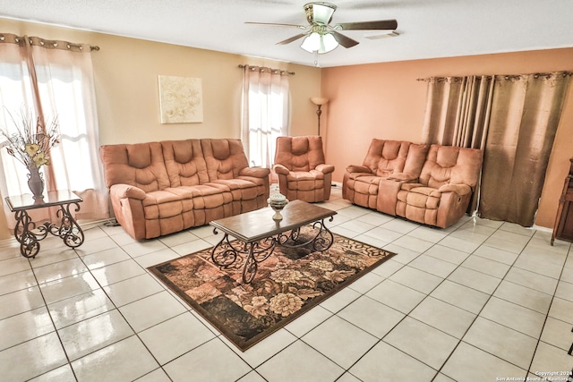 tiled living room with ceiling fan