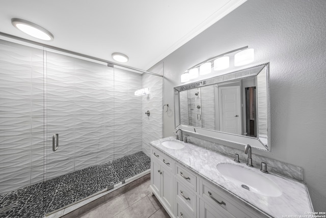 bathroom featuring ornamental molding, tile patterned floors, vanity, and a shower with shower door