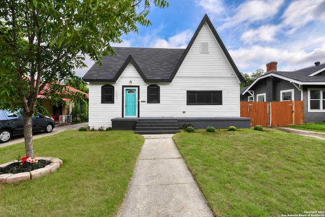 view of front of property with a front lawn