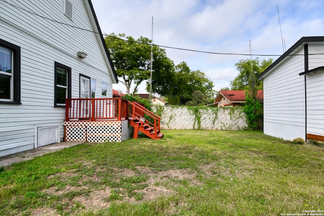 view of yard featuring a deck