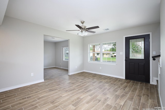 439 Susanwood Dr, San Antonio, TX 78220 - foyer with light wood-type flooring, visible vents, baseboards, and a ceiling fan
