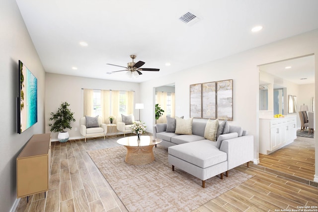 439 Susanwood Dr, San Antonio, TX 78220 - living area with visible vents, recessed lighting, a ceiling fan, and wood tiled floor