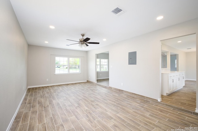 439 Susanwood Dr, San Antonio, TX 78220 - unfurnished room with light wood finished floors, visible vents, electric panel, recessed lighting, and a ceiling fan