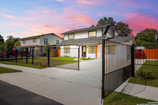 view of front of home featuring a yard