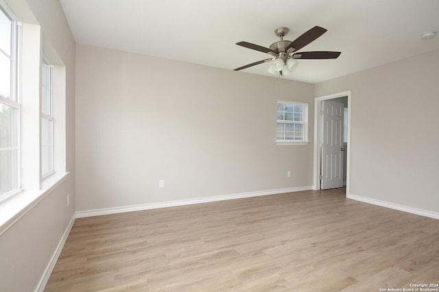 439 Susanwood Dr, San Antonio, TX 78220 - empty room featuring light wood finished floors, baseboards, and ceiling fan