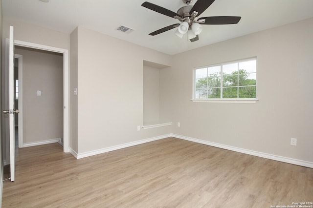 439 Susanwood Dr, San Antonio, TX 78220 - empty room featuring a ceiling fan, light wood-style flooring, baseboards, and visible vents