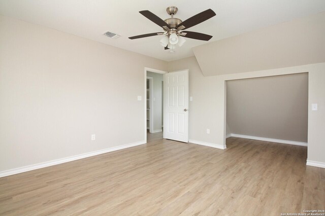 bedroom featuring a closet, wood-type flooring, and ceiling fan