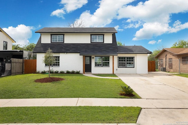 439 Susanwood Dr, San Antonio, TX 78220 - view of front of home featuring concrete driveway, fence, a front lawn, and a shingled roof