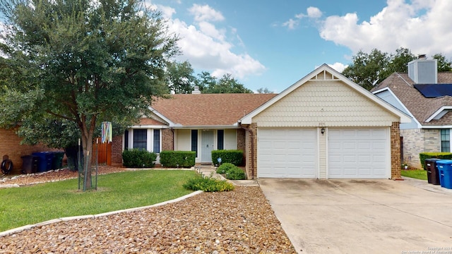 ranch-style house with a front yard and a garage