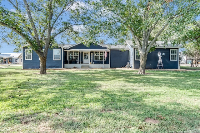 ranch-style home with a front lawn