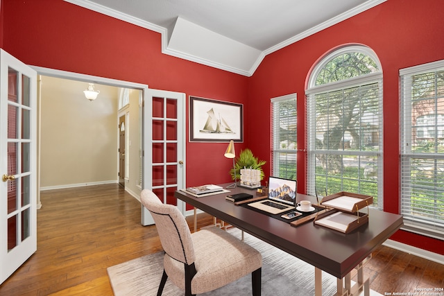 home office with ornamental molding, wood-type flooring, and lofted ceiling