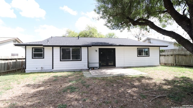 rear view of property with a patio