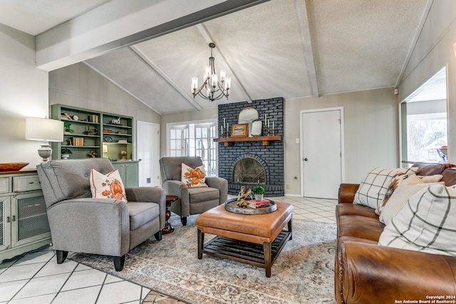 living room featuring light tile patterned floors, a brick fireplace, a textured ceiling, lofted ceiling with beams, and an inviting chandelier