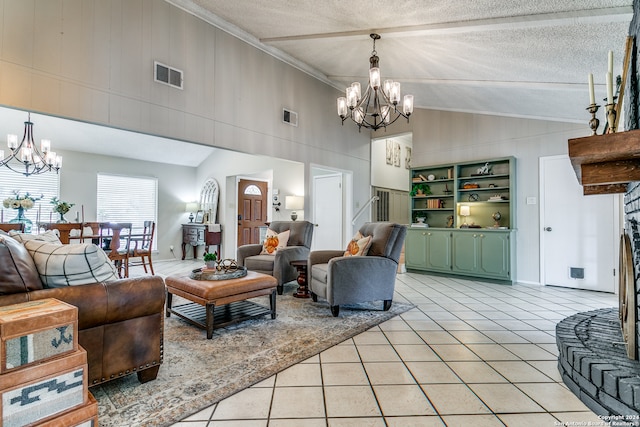 tiled living room featuring an inviting chandelier, vaulted ceiling, and a textured ceiling